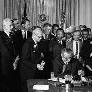 Lyndon Johnson signing the Civil Rights Act of 1964