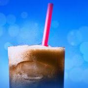 Fizzy soda with straw in a glass