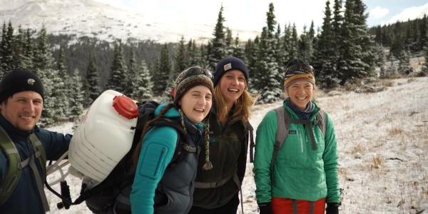 Graduates on a snowy mountain