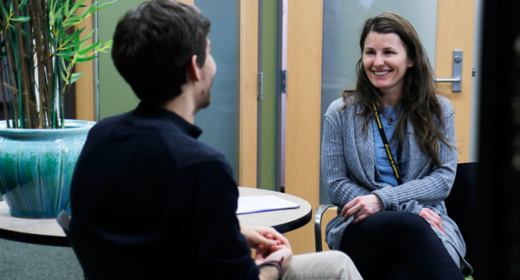 Student meets with a counselor through CAPS program