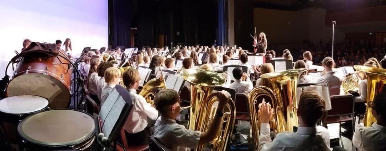 Claire conducting band