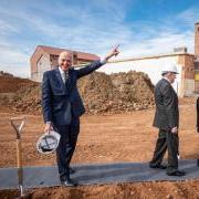 Rob waving at the groundbreaking