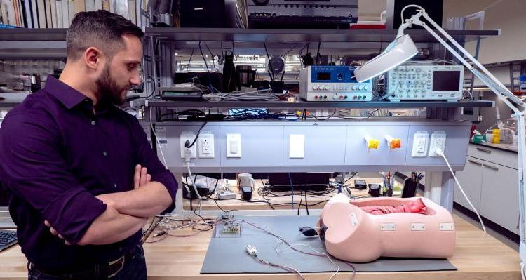 Mark Rentschler next to Endoculus device