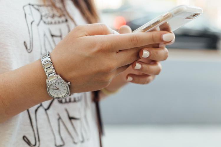 Young person checking cellphone