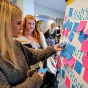 Participants map out challenges with sticky notes at the fall 2017 summit