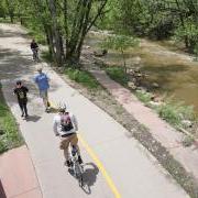 Cyclists and pedestrians using the Boulder Creek Path