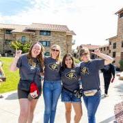 Volunteers pose for a photo during move-in