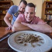 Dave Baugh with plate of crickets; Lars Baugh eats Lithic Nutrition cricket bar