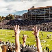 Fans cheering on the Buffs at the spring football game