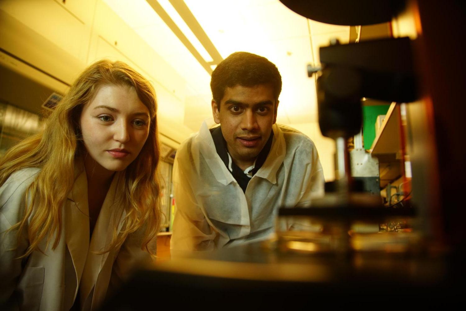 researchers in a lab